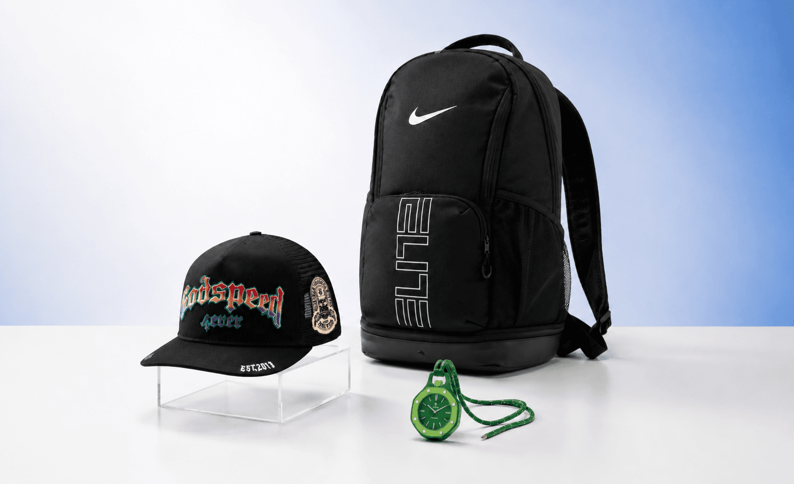 A curated assortment of a backpack, cap, watch, and accessories