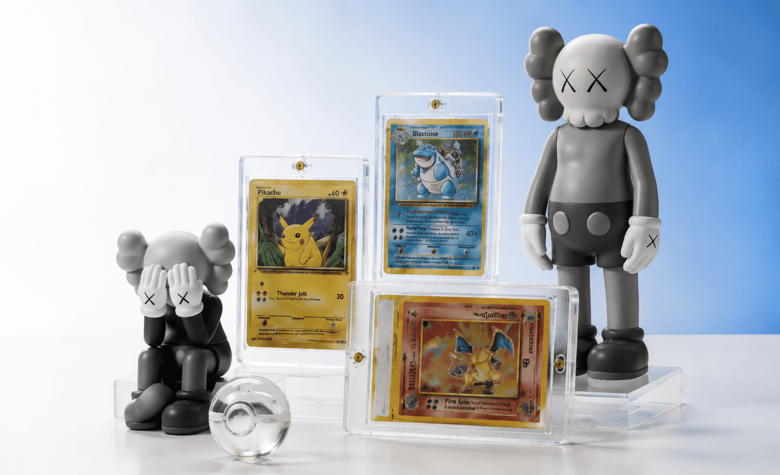 Collectible figures and trading cards displayed in protective cases
